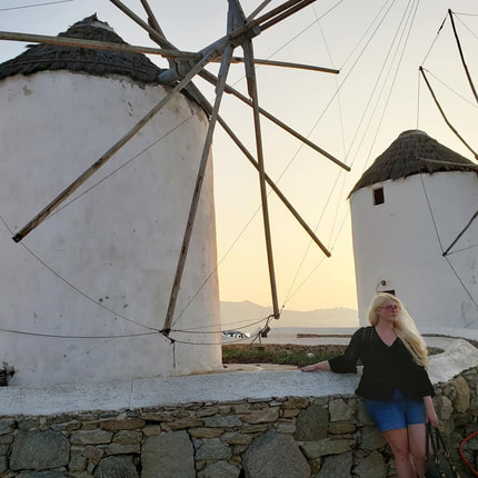 Actress, writer, Tracy Cahill at the windmills in Mykonos.