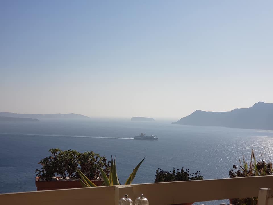 View from Oia Santorini high street cafe by Tracy Cahill